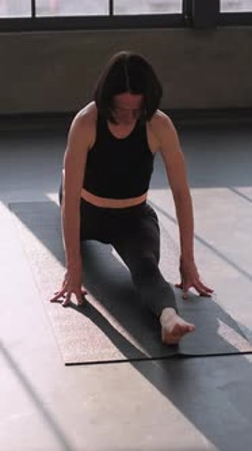 Woman Doing Yoga at Home