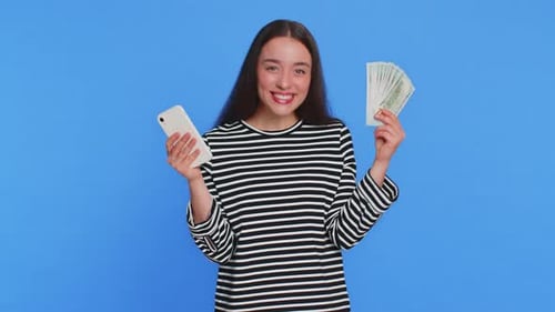Excited Woman Wins Money on Phone