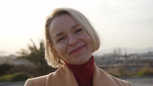Smiling Woman in Coat Close Up Portrait