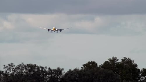 Commercial Airplane Flying in for a Landing Approach