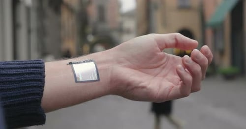 Futuristic Device Shows Video Chat on Wrist
