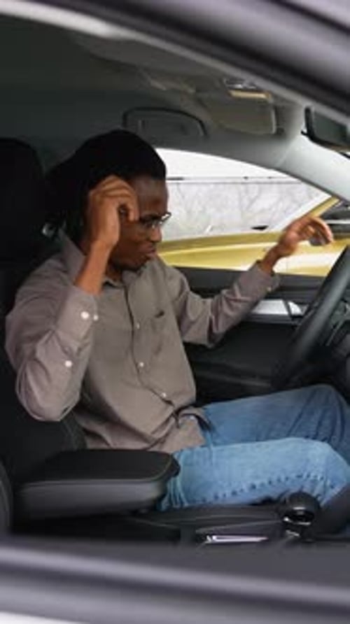 Man Plays Air Drums in Car