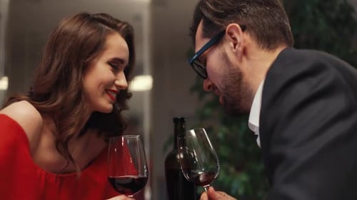 Cute Happy Ukrainian Girl with Dimples Smiling and Talking with Likable Man Young Couple in Love