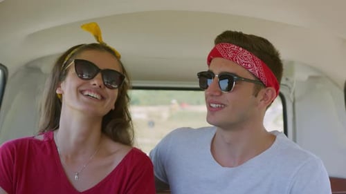 Couple enjoying a fun-filled road trip amid scenic views