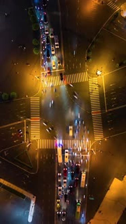 Aerial Timelapse of Evening Traffic at Intersection in Ho Chi Minh City Vietnam