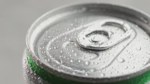 Opening Soda or Beer Can Macro Close Up of Can Pull Tab Opening Watering Refreshment Hand Open