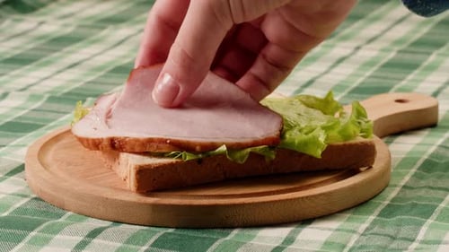 Preparing a Simple Sandwich with Ham and Lettuce