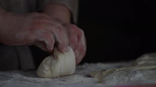 Artisanal Bread Dough Preparation Handcrafted from Grain Flour in Traditional Bakery Wood-Fired Oven