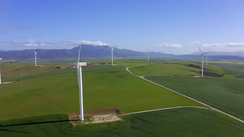 4k video footage of wind turbines out on an open field