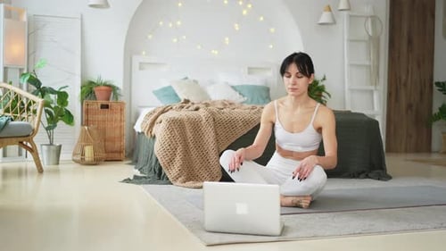 Yoga Mindfulness Meditation Online Woman Practicing Yoga with Online Lessons in Laptop at Home Woman