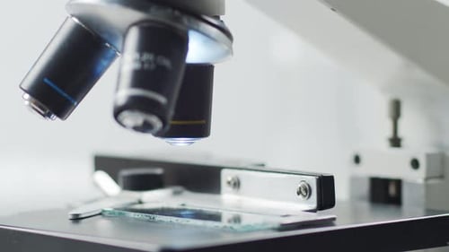 Closeup of Scientific Microscope Laboratory in Hospital Epidemic Disease Healthcare Vaccine Research