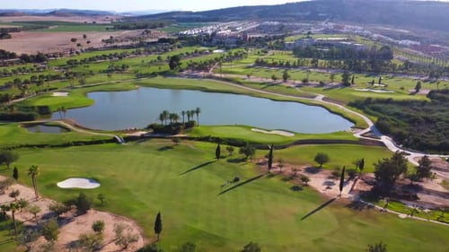 Wide Aerial View of a Luxury Green Golf Course