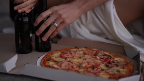 Pizza and beer close up shot