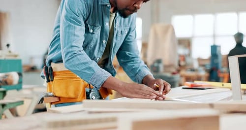 Construction, wood and planning with black man in workshop for manufacturing, measure and building
