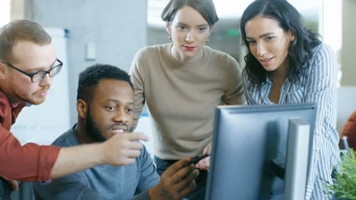In the Busy Corporate Office Team of Diverse Young Creative People Work on a Problem Solution. Coll