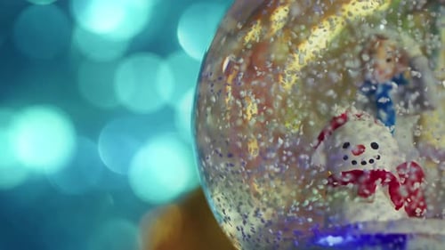 Christmas Concept Snowing On Santa Claus Sphere And Colorful Bokeh 2