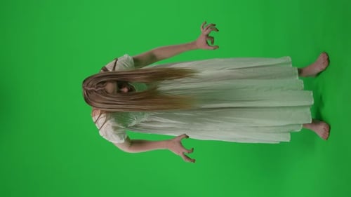 Fullsize Vertical Green Screen Chroma Key Video of a Posessed Female Woman Figure Ghost Poltergeist