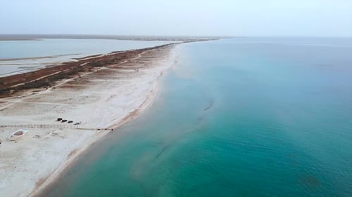 Aerial Drone Flying Over Sandy Spit Coastline Media