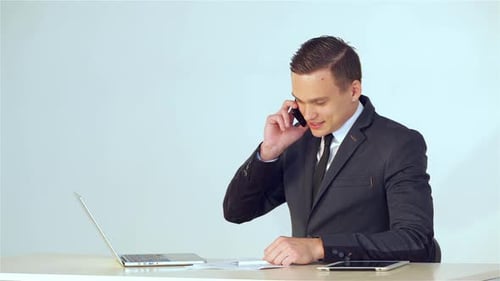 Young Businessman Making a Phone Call