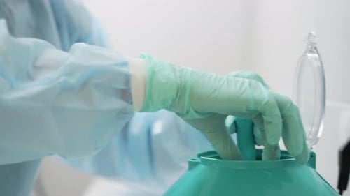 Doctor in Gloves Works with Blood Test Tubes for Analysis of Chinese Coronavirus Scientist