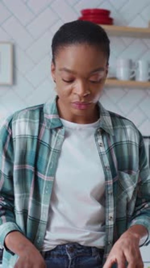 Young Afroamerican Woman Making Online Cooking Class Talking on Videochat Digital Tablet Explaining