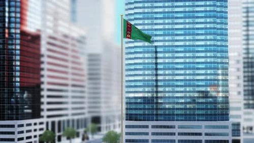 Turkmenistan Flag Waving on Skyscraper Pole with Modern City Backdrop