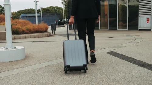 Tourist Man with Suitcase Baggage in Spain A Traveler with Luggage Suit Jacket on Business Street Go