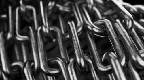 Chain movement along the camera. Unique link in the chain. Get rid of weakness. Symbol of strength,