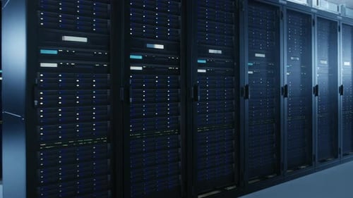 Moving Walkthrough Shot of Modern Data Center With Multiple Rows of Fully Operational Server Racks.
