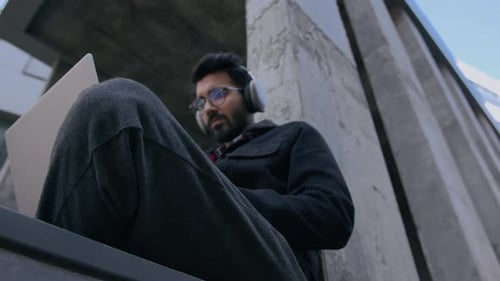 Moving Shot Arabian Indian Businessman University Student Business Man in City Learning Online Using