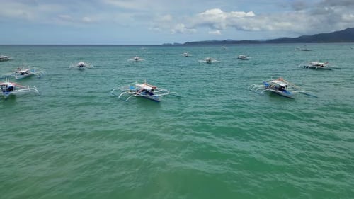 Bateaux traditionnels philippins en mer
