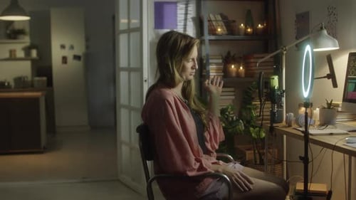 Woman Live Streaming on Social Media at Home Studio