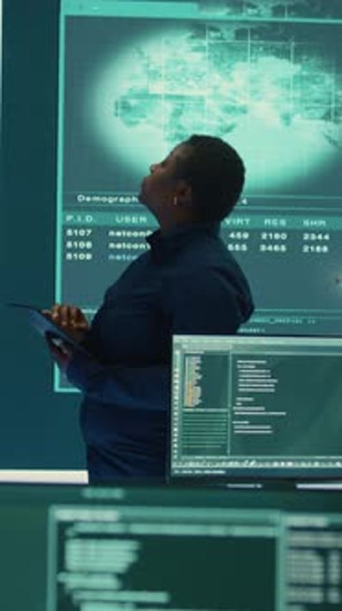 Vertical Video Professional IT Expert Working in a Governmental Security Operations Center