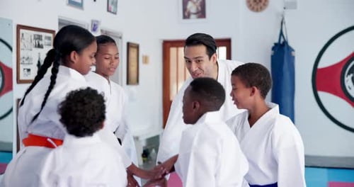 Children Celebrate Martial Arts Success with Instructor