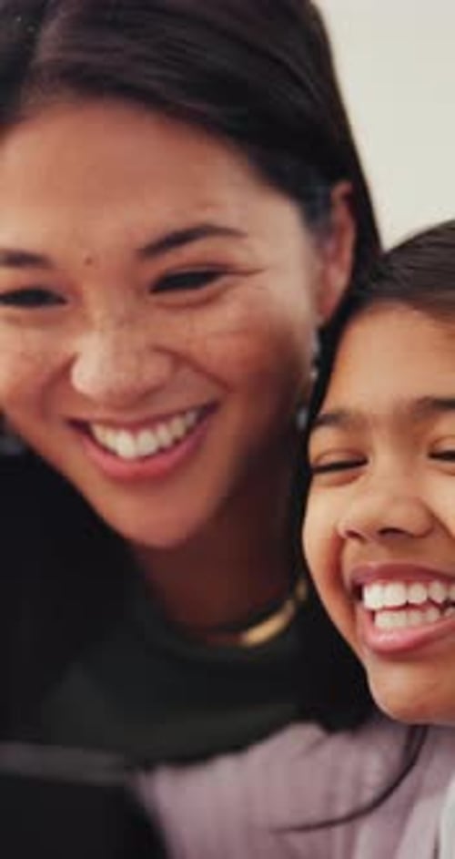 Mother, girl child and tablet for games, elearning or streaming video with laughing