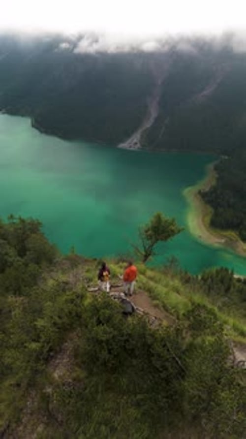 Exploring Breathtaking Cliff Views Over Turquoise Waters at Dawn Plansee Austria