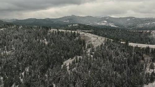 Gloomy Atmosphere In Forest Mountain Near Sun Valley During Winter In Idaho, USA. Aerial Drone Shot