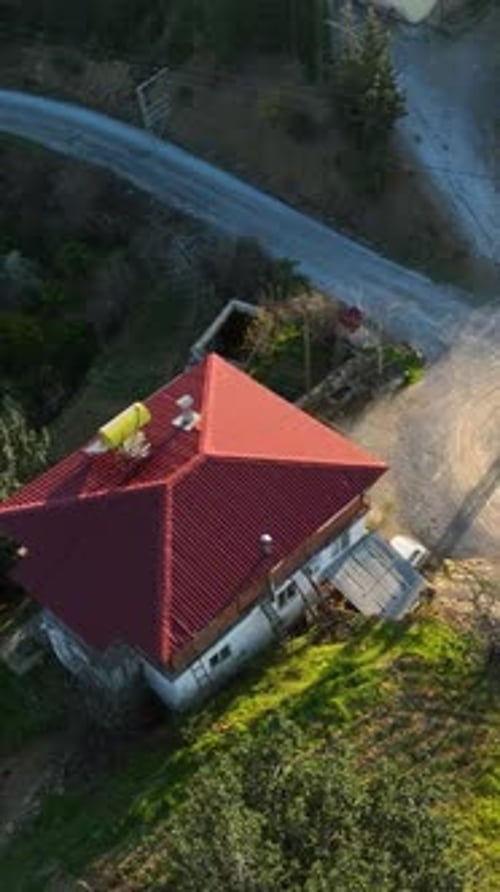 Vertical Video Above Farming Haven Aerial View of Mountain Homes Green Gardens and Forests