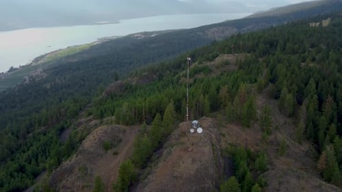 Radio Communications Cell Tower Transmitter on a Remote Mountain. Satellite Dishes, 5G Data Signal B