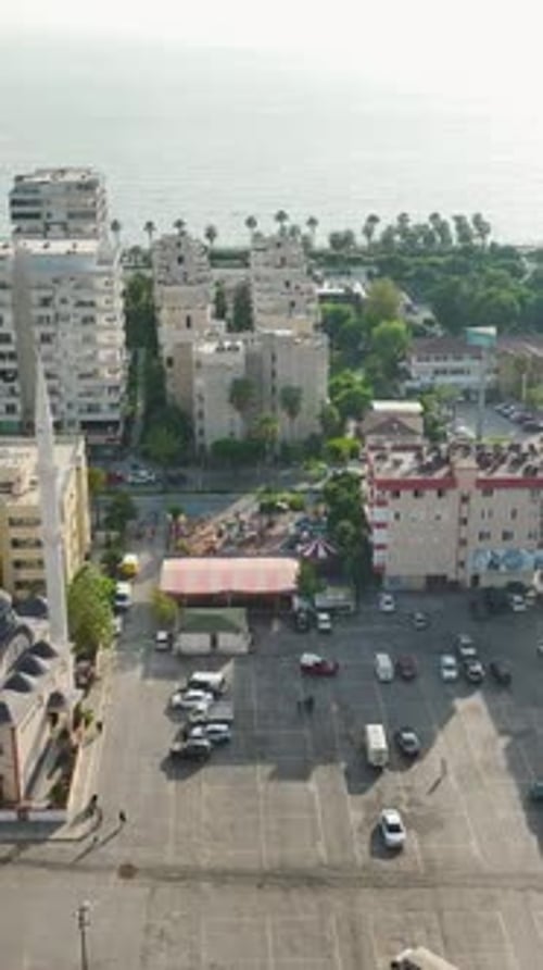 Vertical Video Aerial Marvel of a Shopping Center's Creation Crafting with Metal Elements