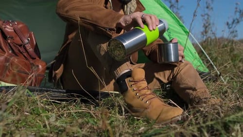 Hiker Tourist Traveler Man Drinking Hot Thermos Cup Mountain Camping Camp Tent Traveling Hikingю