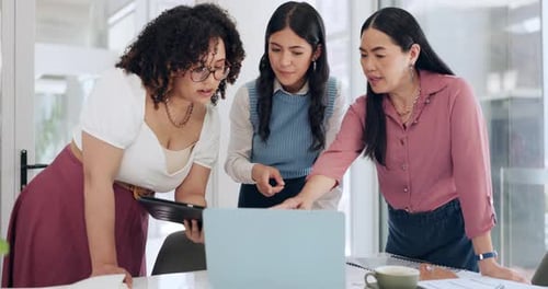 Business women, laptop and research with communication, teamwork and website design in office