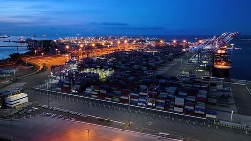 Long beach shipyard illuminated at night