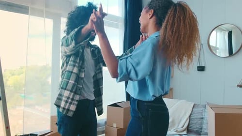 Couple Celebrate Moving Into New Home Together