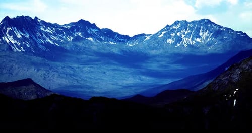Majestic Mountain Range Captured During the Quiet Hours of Morning Light