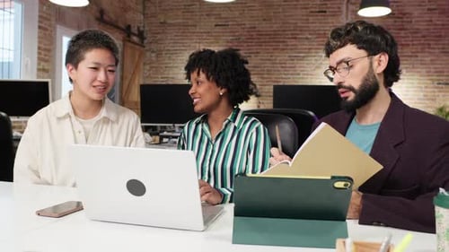 Diverse Team Working Together at Modern Office