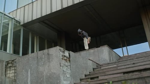 Young Man Doing Parkour Urban Environment Stunts