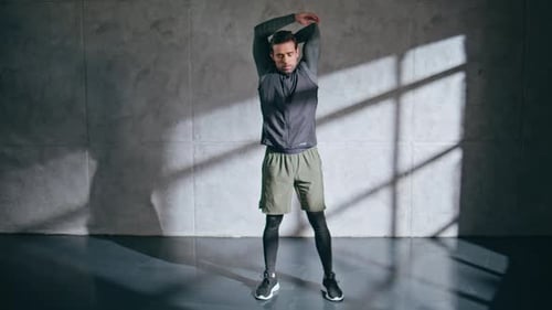 Male Bodybuilder Warming Up Body Fitness Man Stretching Hands n Sport Club