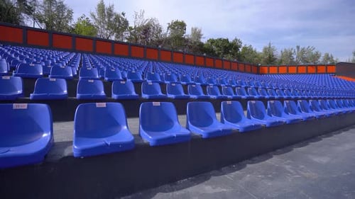 Empty blue seats in the stadium 4K
