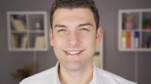 Man Smiling in Close Up, Looking at Camera